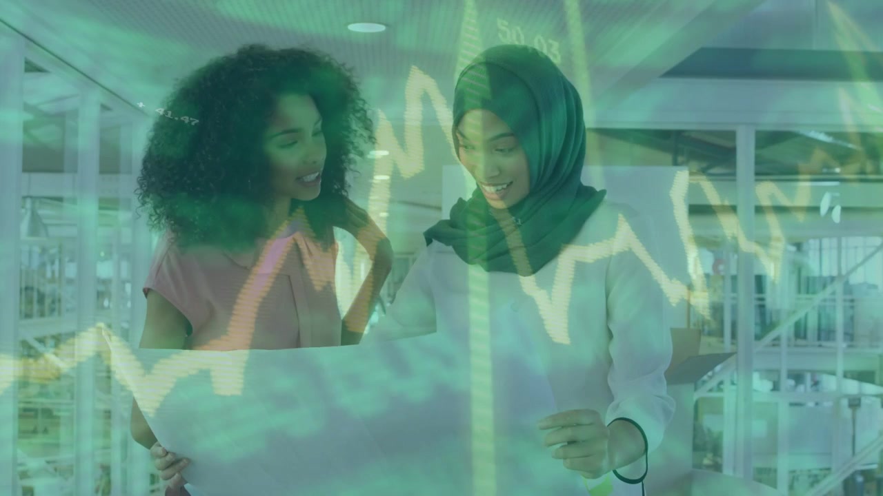 Right woman scanning sheet, peer unrolling and pointing at desk, green chart reviewing finance plan
