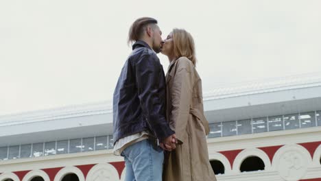 couple kissing outdoors