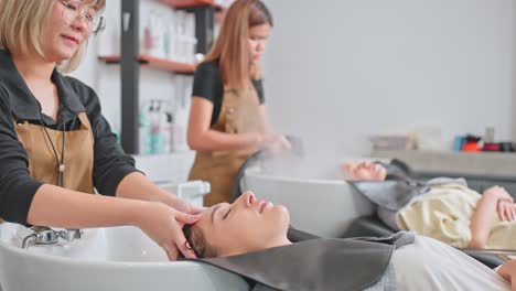 hair washing and treatment in a salon