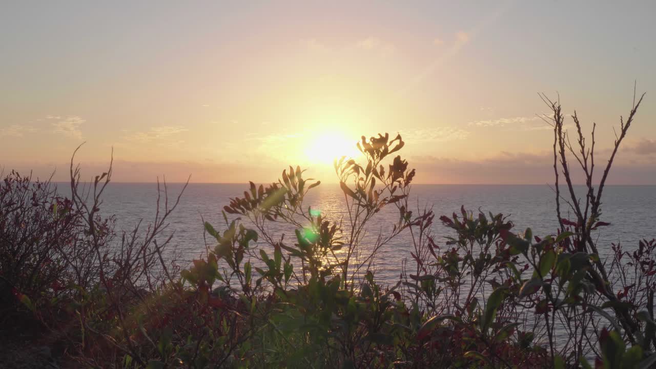 The beautiful bright orange sunset from the Fiji islands - wide shot