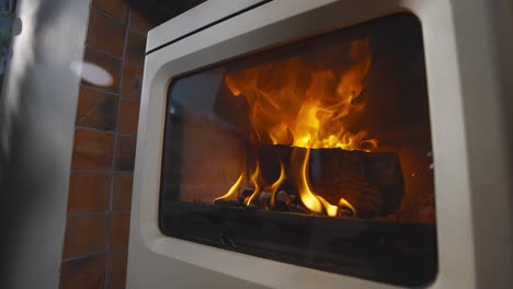 Close-up-slow-motion-fire-burning-wood-in-stove