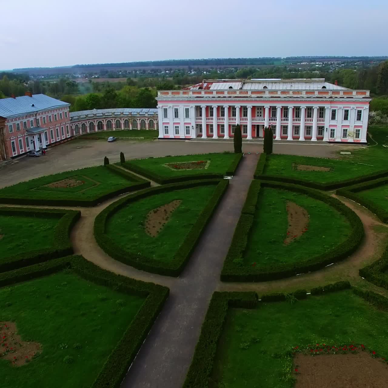 Historical residence with beautiful palaces. Little pond and provincial town scenery at backdrop. Top view
