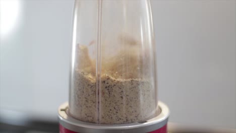 blending biscuits in a blender preparing breakfast