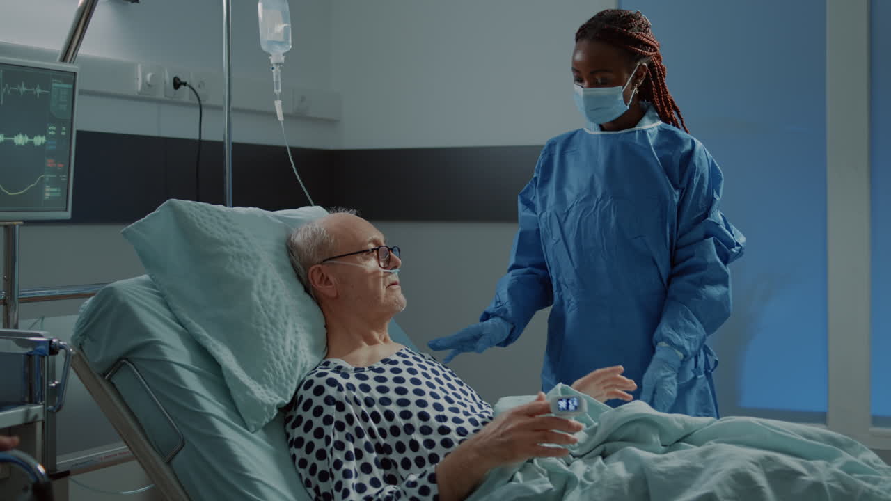 African american doctor talking to patient with disease