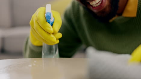 hands, person and spray bottle for cleaning table