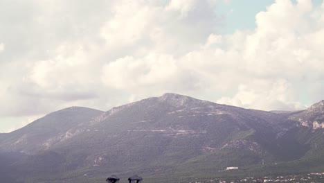 Wide-panoramic-shot-of-Parnitha-mountain,-Athens,-Greece,-on-a-cloudy-autumn-day