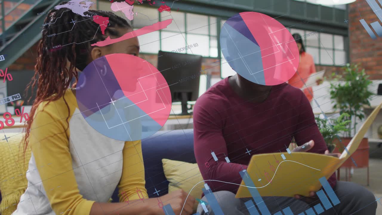 Animation of infographic interface over diverse coworkers discussing reports in office