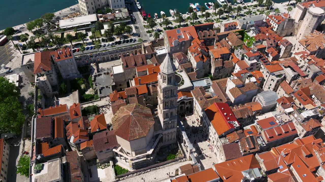 Split Old Town And Historic Saint Domnius Cathedral On A Sunny Day In Croatia. - aerial shot
