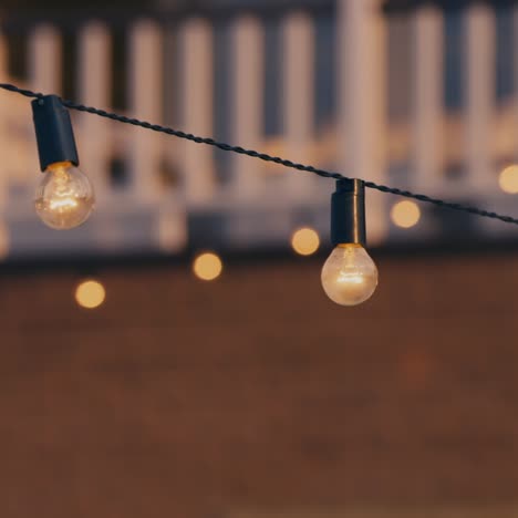 Light-bulb-string-at-an-outdoor-party