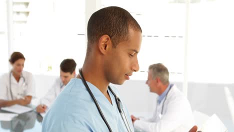 male nurse going over a file