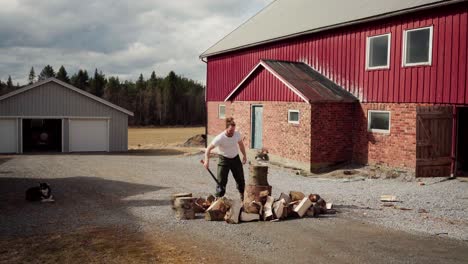 Man-Chopping-Firewood---Wide-Shot