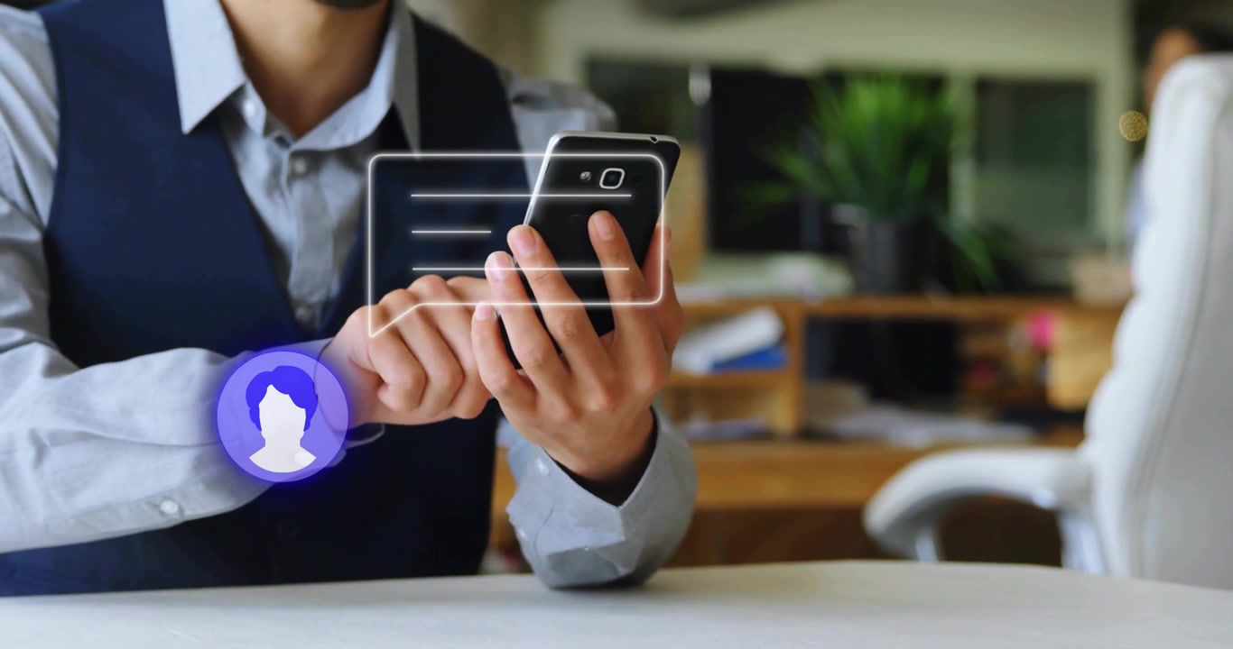 Mature man tapping smartphone screen and navigating translucent UI overlays in office for business