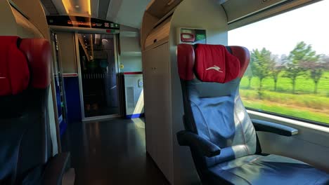 train interior with passing countryside views