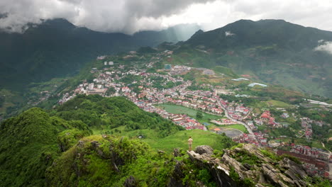 breathtaking aerial view of a city nestled in a mountain valley