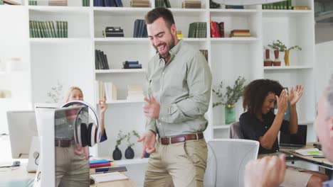 Colleagues-discussing-in-the-office