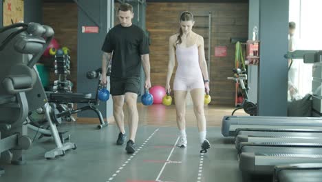 gym workout with kettlebells
