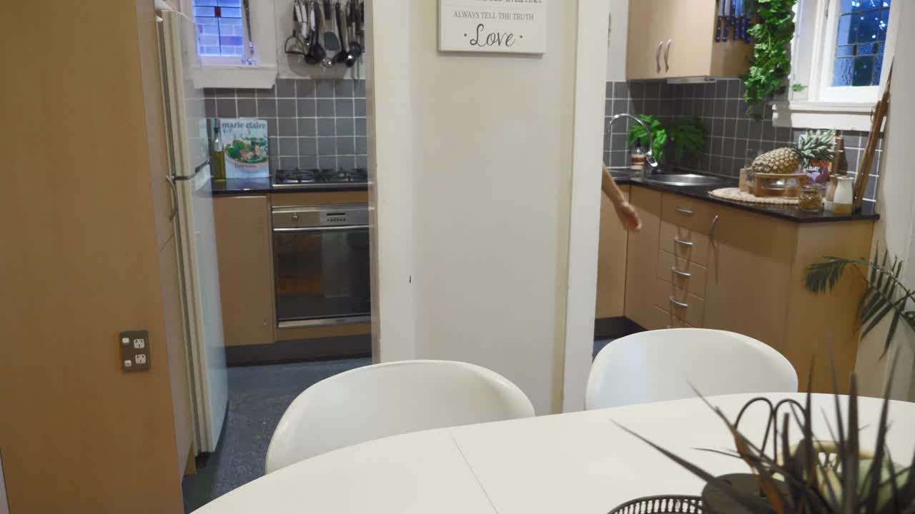 Happy Young Woman in Her Beautiful Apartment