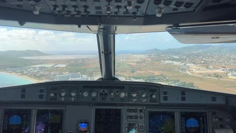 Approach-and-landing-to-Ibiza-Airport,-Spain,-shot-from-the-cockpit-of-an-Airbus-320-in-a-sunny-morning