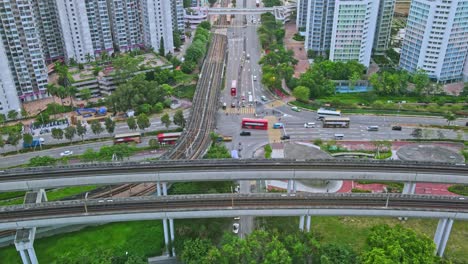 Lapso-De-Tiempo-Aéreo-Del-Tren-Ligero-Mtr-Y-La-Línea-Tuen-Ma,-Tin-Shui-Wai,-Hong-Kong