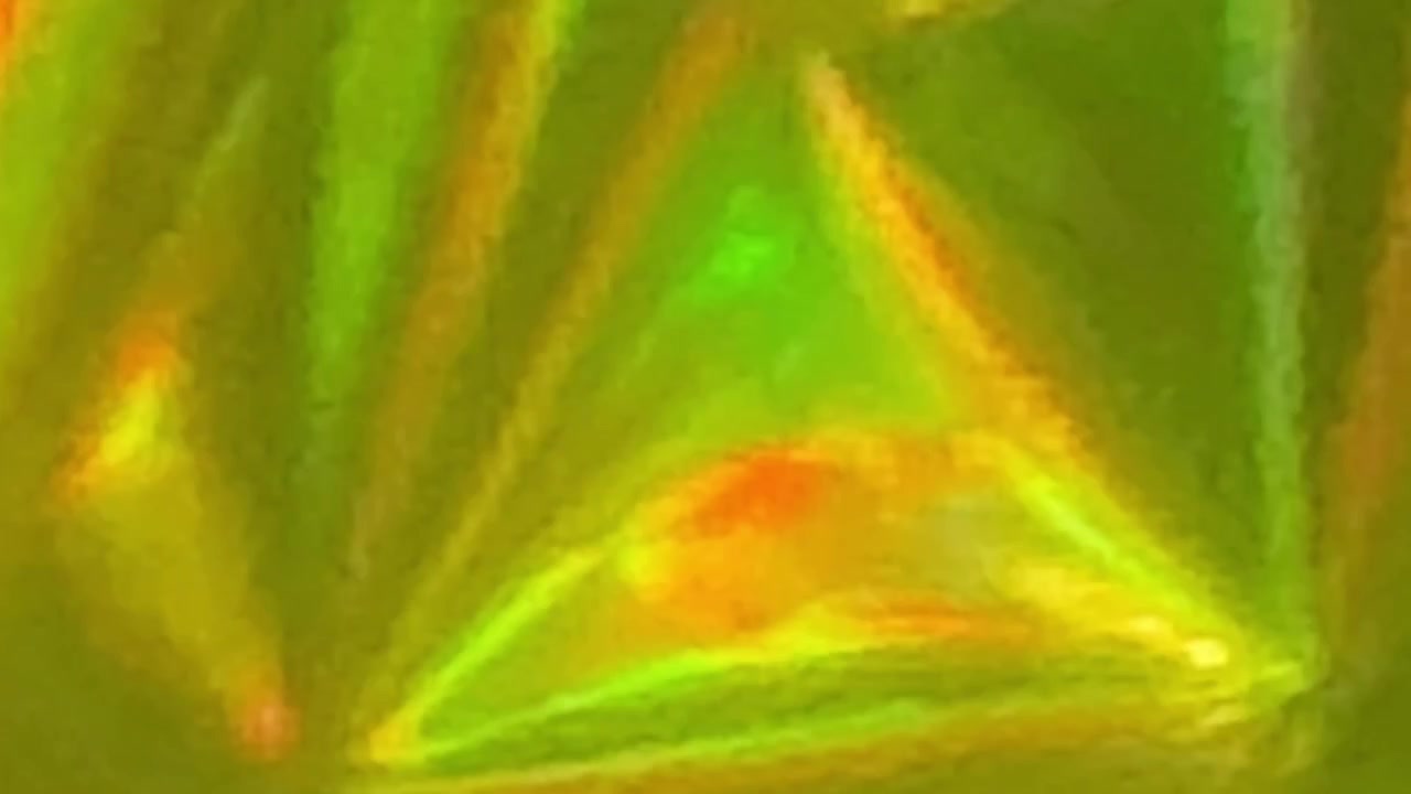 Abstraktní holografická textura s měnícími se duhovými odlesky světla