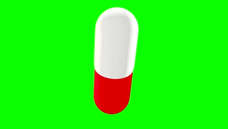 pill in white and red color spinning on green screen
