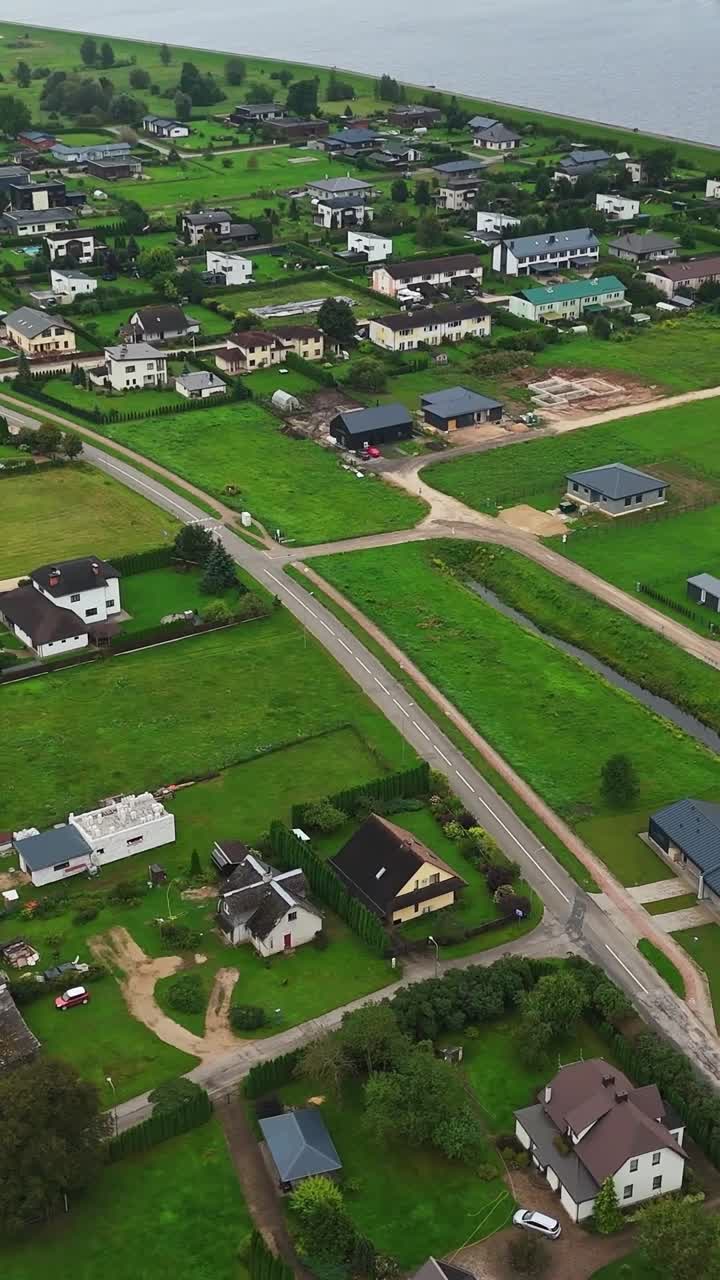 Aerial view of Ikskile's lush green landscapes and scattered houses