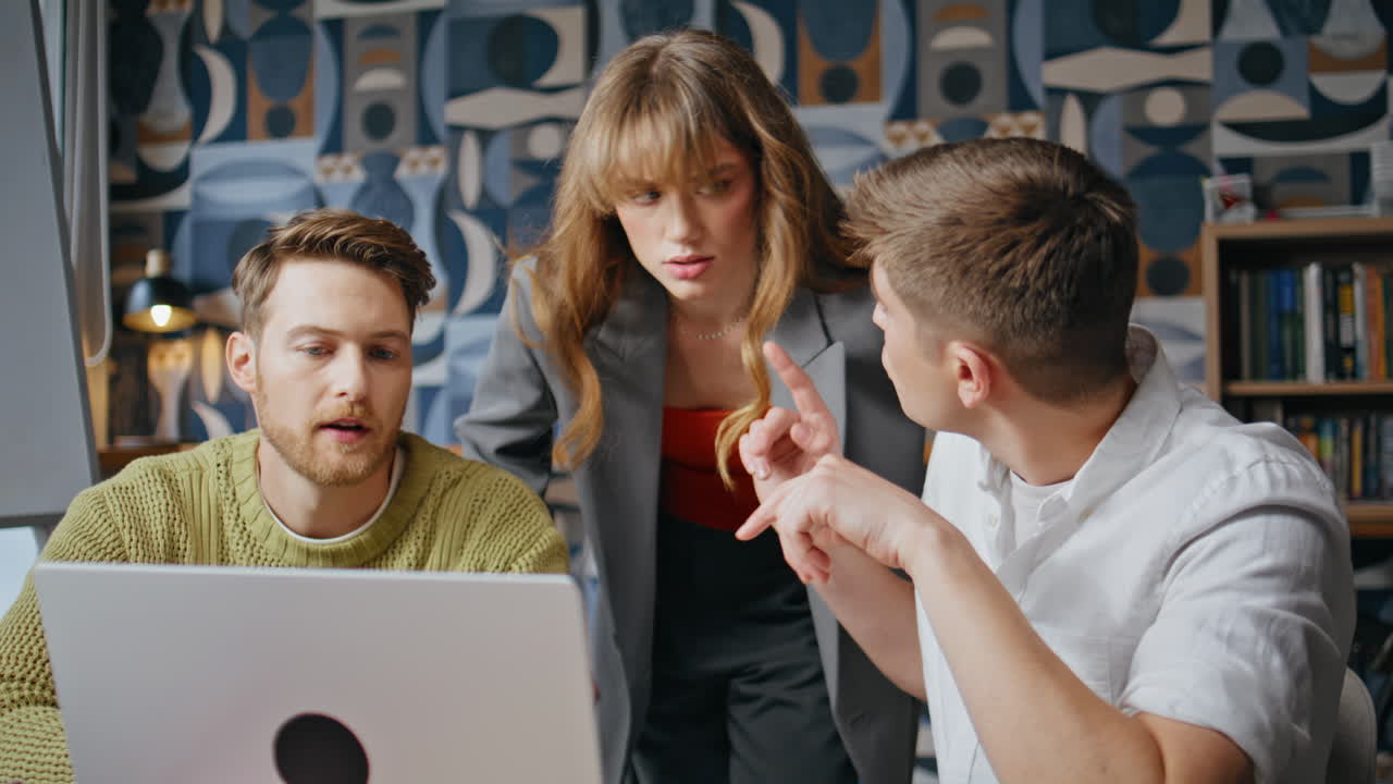 Focused coworkers creating ideas brainstorming at office conference room desk