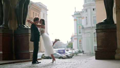 happy couple dancing outdoors