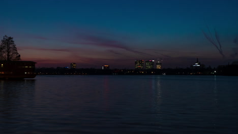 sunset over city lake