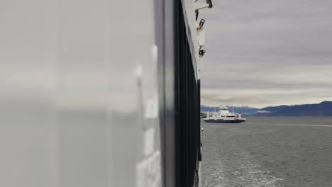 exterior of a car ferry cruising in molde, norway on a cloudy day