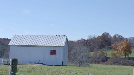 Farm-in-the-countryside-with-American-Flag-on-the-barn