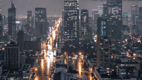 city lights glowing on rain soaked asphalt, reflecting dramatic urban energy beneath stormy evening sky with luminous street scene spreading across metropolitan landscape