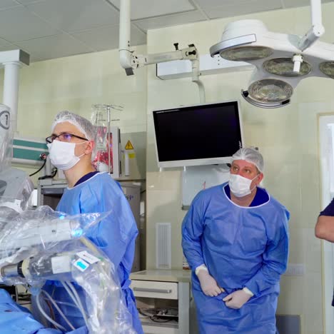 performing robotic surgery in hospital. doctor operation in surgery room at hospital