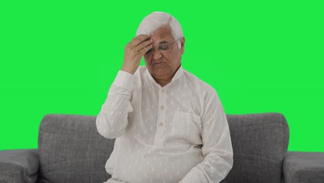 Sick-Indian-old-man-having-a-headache-Green-screen