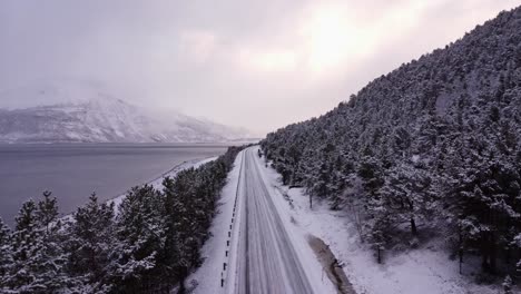 Lonely-road-at-the-fjords-in-Norway-covered-with-snow