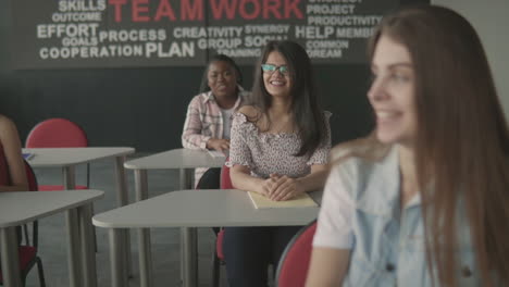 multicultural group of university students in class