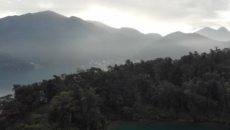 arial drone shot of sun moon lake and ita thao just before sunrise