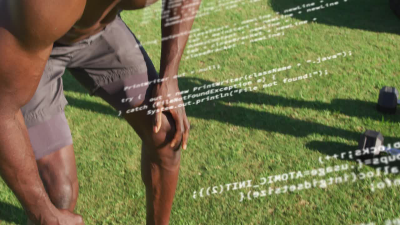 Man adjusting grip doing dumbbell lift on field code overlay partly obscuring him for fitness