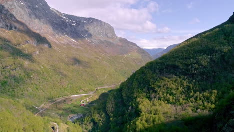 Aerial-view-of-mountainous-woods-and-winding-roads