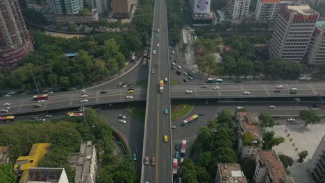 sunny day guangzhou city traffic street road circle crossroad aerial topdown panorama 4k china