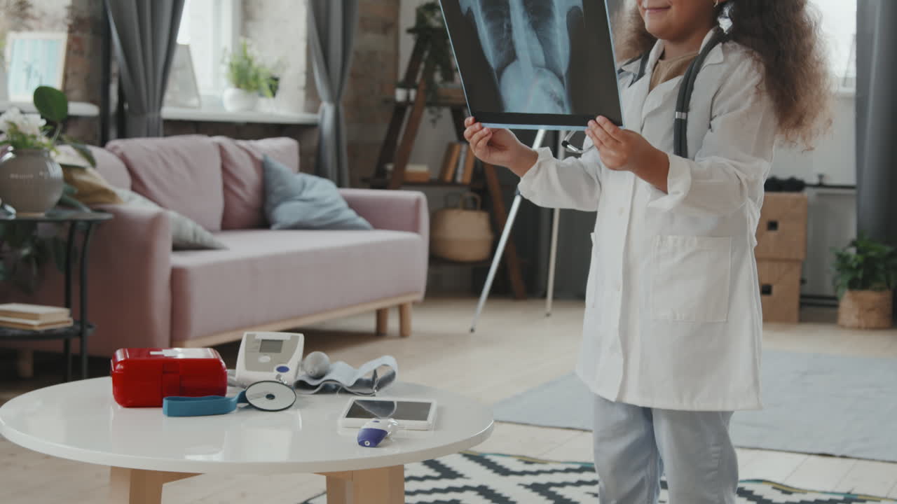 Portrait of Little Girl Playing Doctor