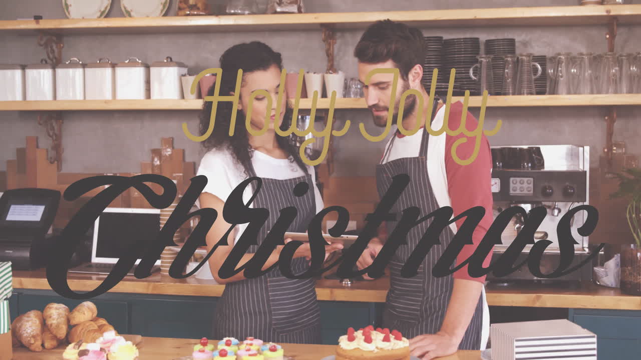 Decorating cakes in kitchen, couple adding animation with Holly Jolly Christmas text