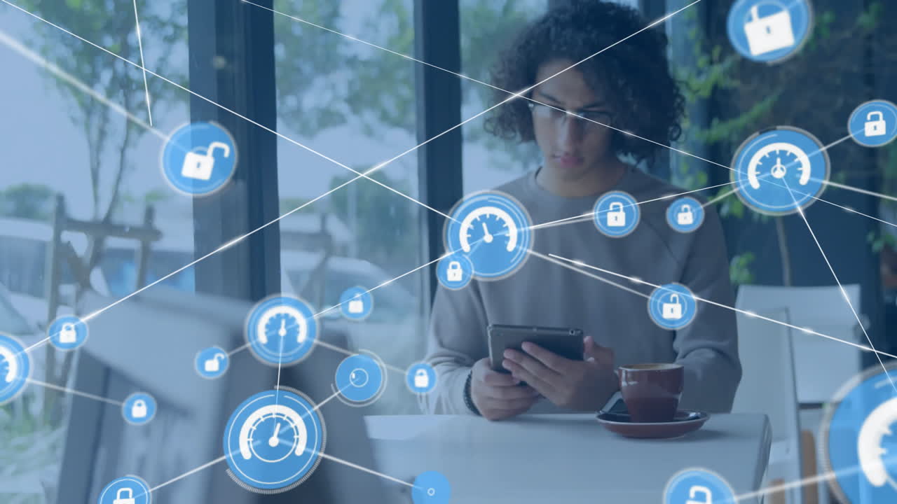 animación de una red de conexiones con iconos sobre un hombre biracial usando una tableta
