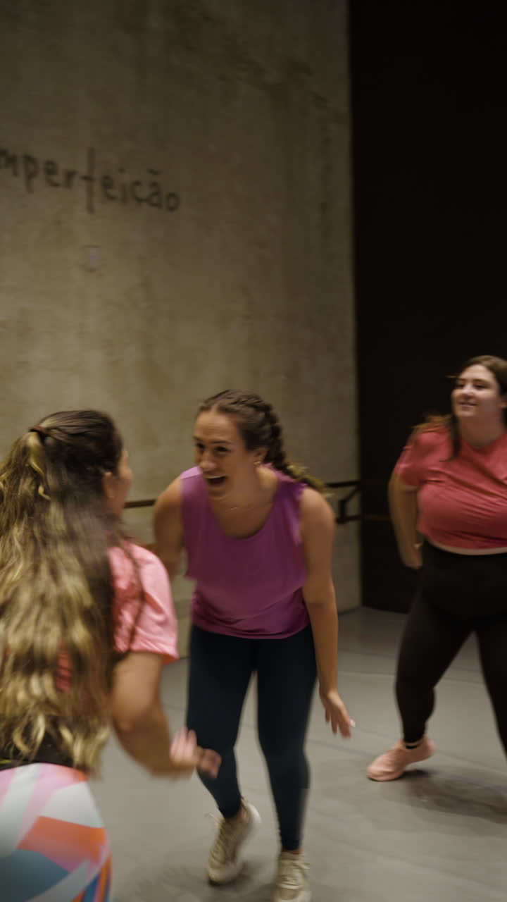 Women dancing indoors
