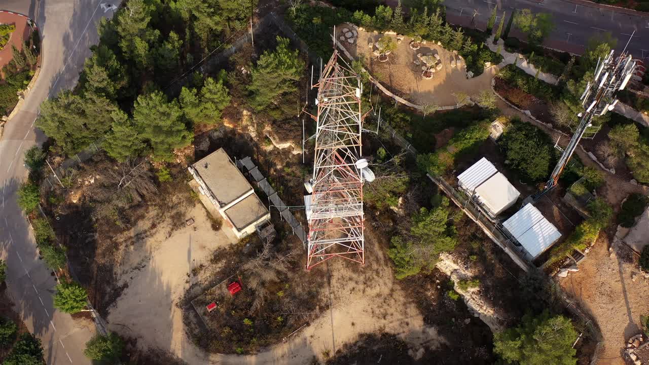 Aerial View of a Telecommunication Facility in a Hilly Area