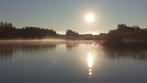 calm misty morning in a beautiful lake area