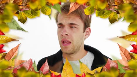 Man-with-allergy-sneezing-and-frame-of-autumn-leaves-4k