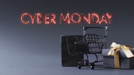 animation of cyber monday text over shopping trolley and gifts