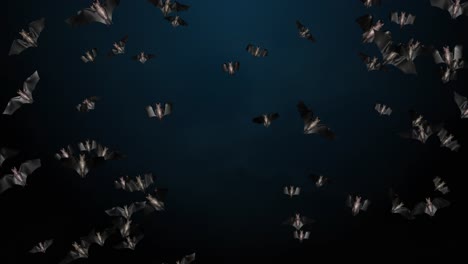flying bats on dark and green backgrounds