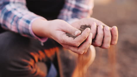 Young-Hands-Of-A-Woman-Farmer-Hold-Black-Soil-The-Beginning-Of-Spring-Work-In-The-Field-Organic-Farm